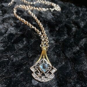 esbe Sara Blaine blue topaz pendant and chain. Sterling and brass